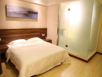 Super 8 Yantai Train Station Dayue Cheng Hotell Rom bilde